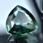Natural deep green sapphire, 5.50 carats, a trillion-shaped loose gem